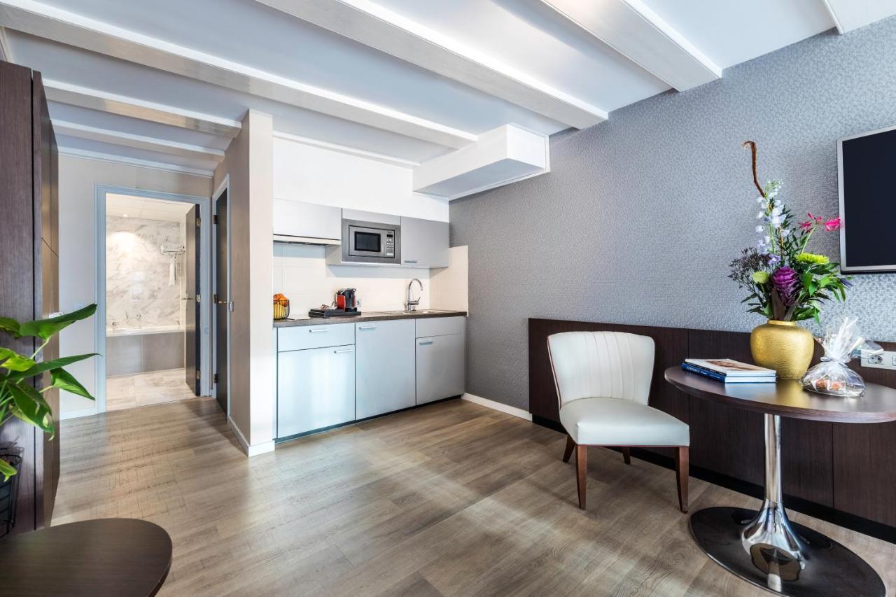 Nh Collection Amsterdam Barbizon Palace Esterno foto A typical apartment at the hotel